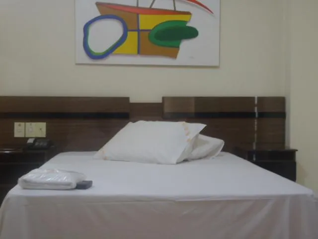 Bed in Colorado Plaza Hotel
