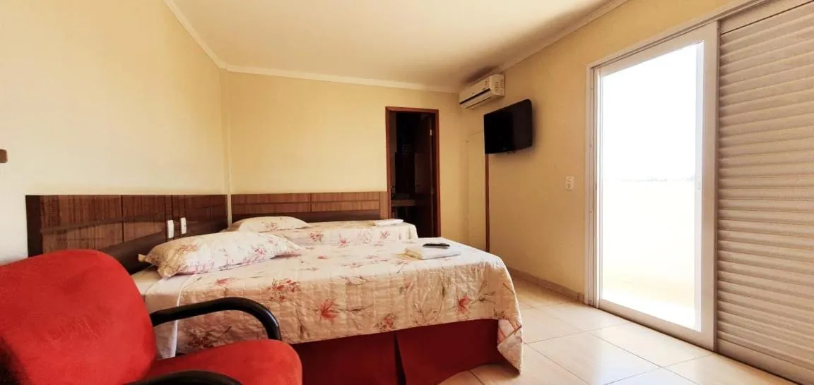 Bed in Colorado Plaza Hotel