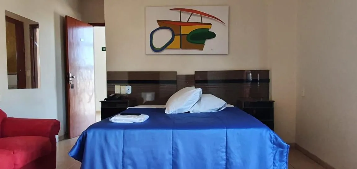 Bed in Colorado Plaza Hotel