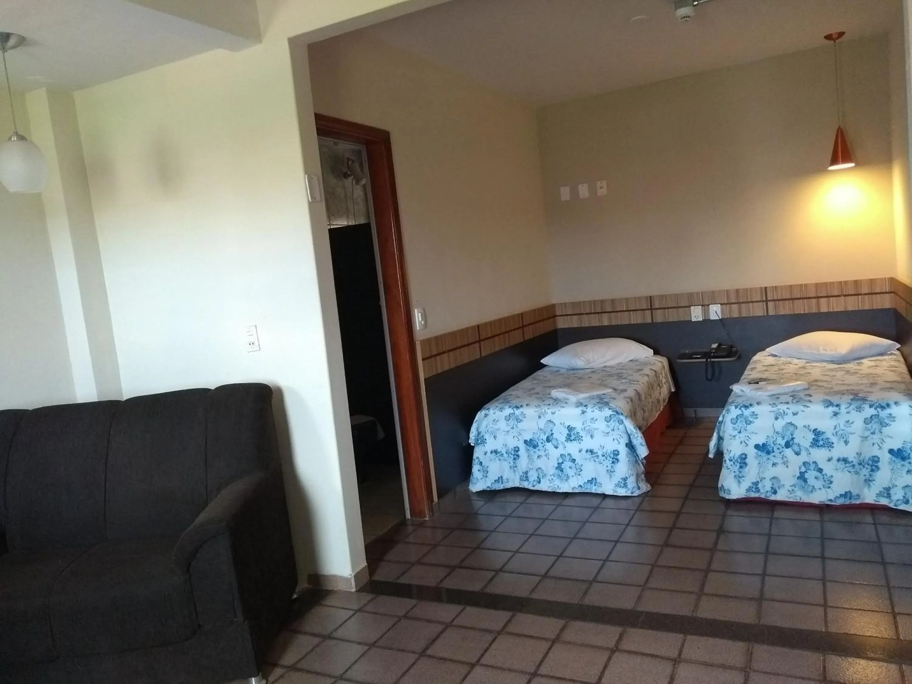 Bed in Colorado Plaza Hotel