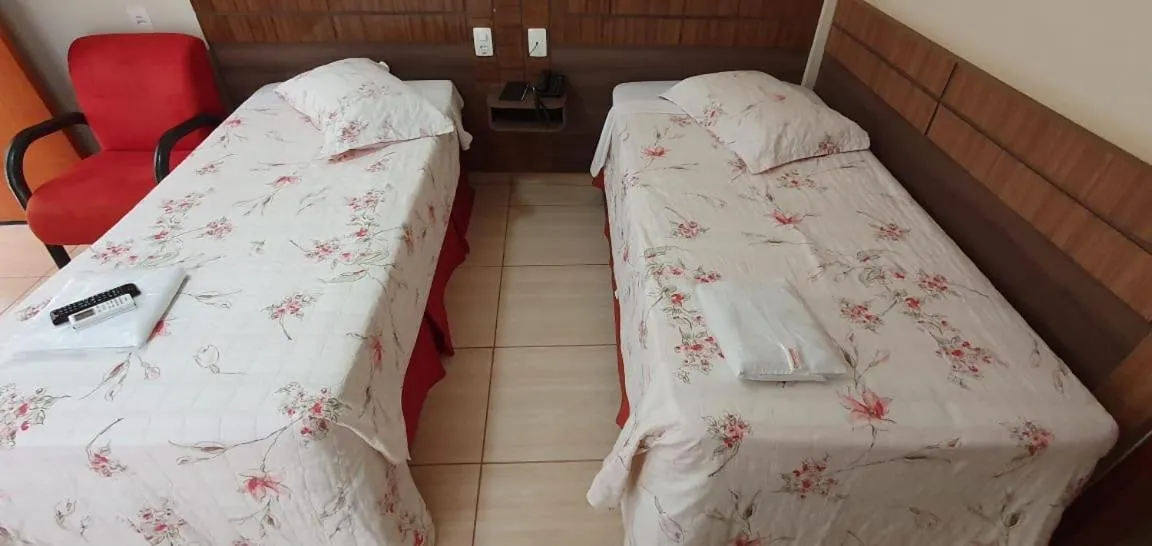 Bed in Colorado Plaza Hotel