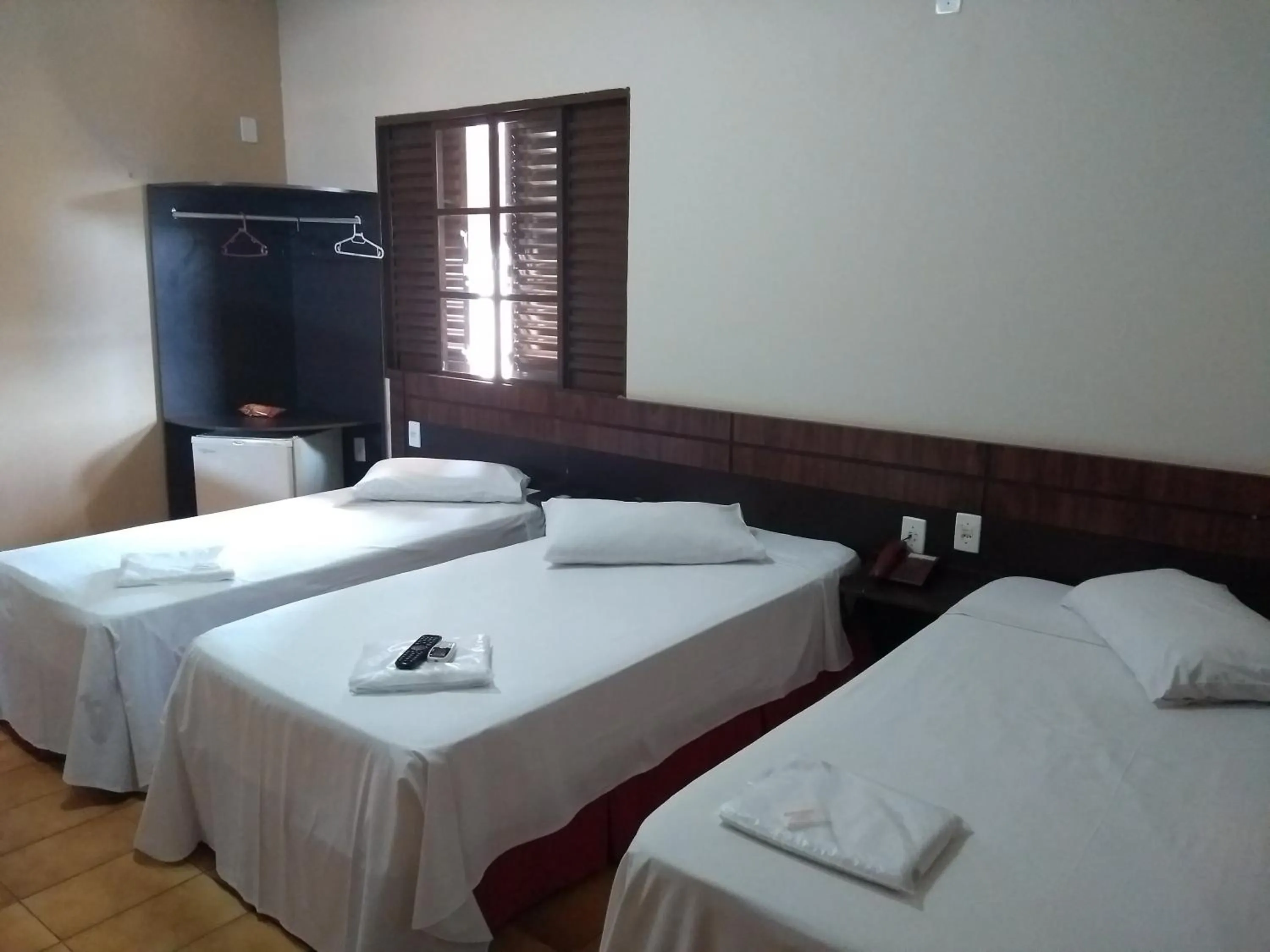 Bed in Colorado Plaza Hotel