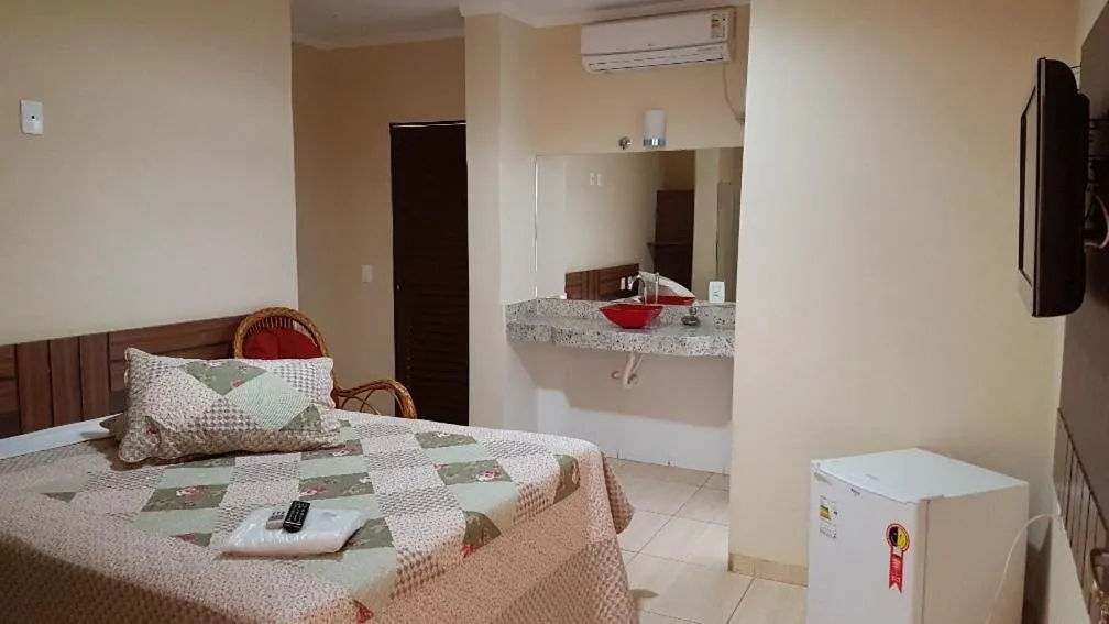 Bed in Colorado Plaza Hotel