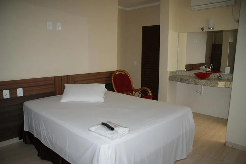 Bed in Colorado Plaza Hotel