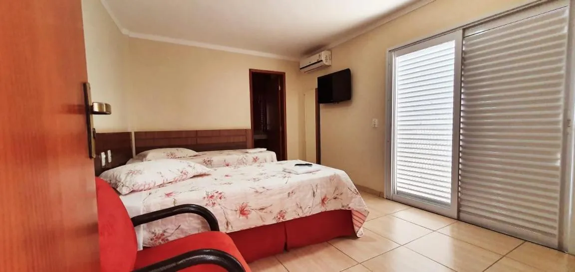 Bed in Colorado Plaza Hotel