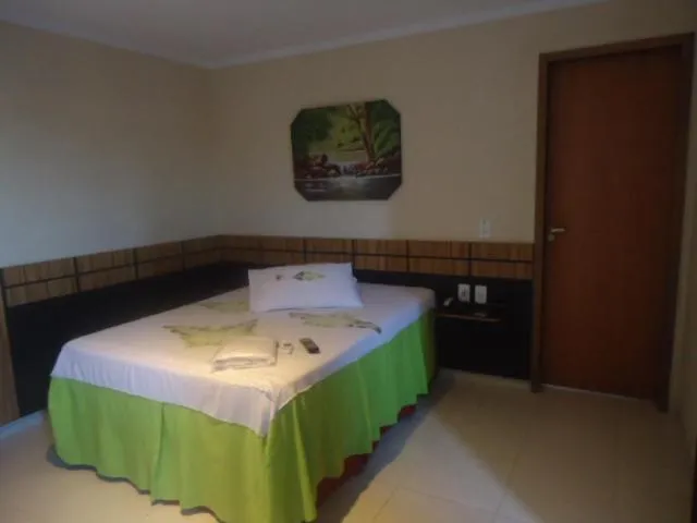 Bed in Colorado Plaza Hotel