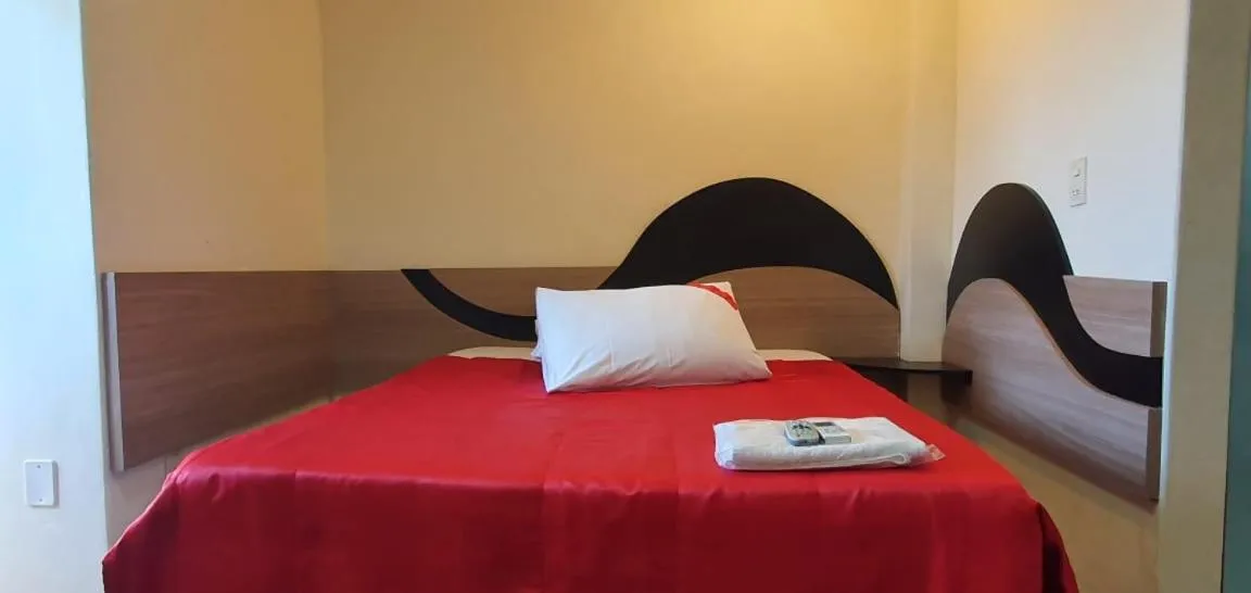 Bed in Colorado Plaza Hotel