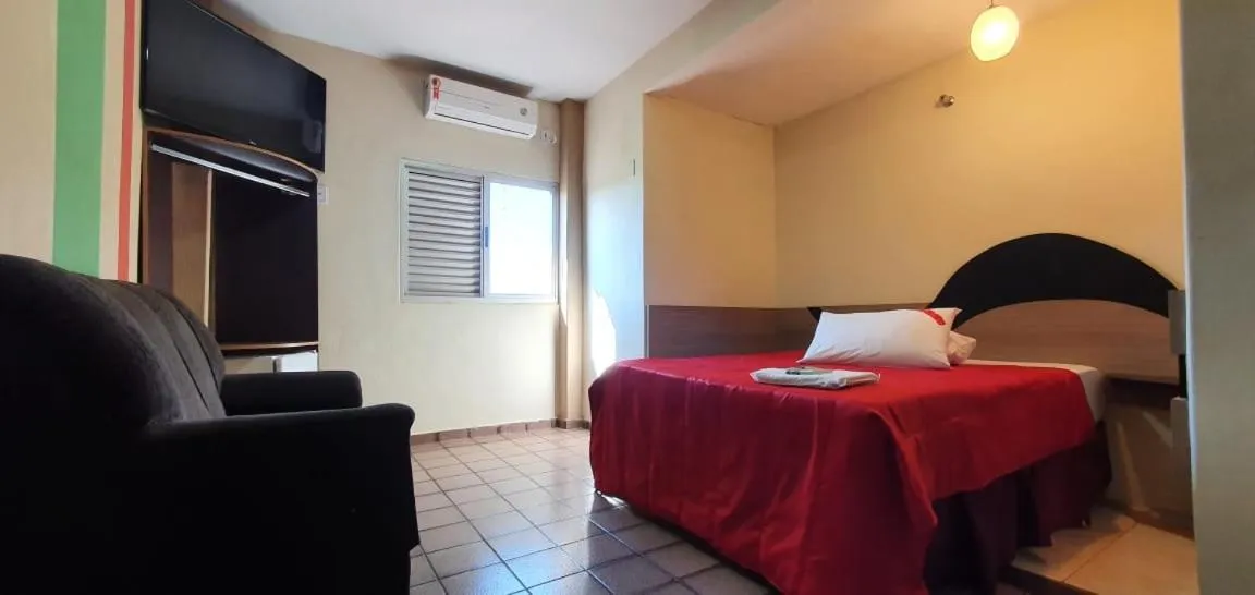 Bed in Colorado Plaza Hotel