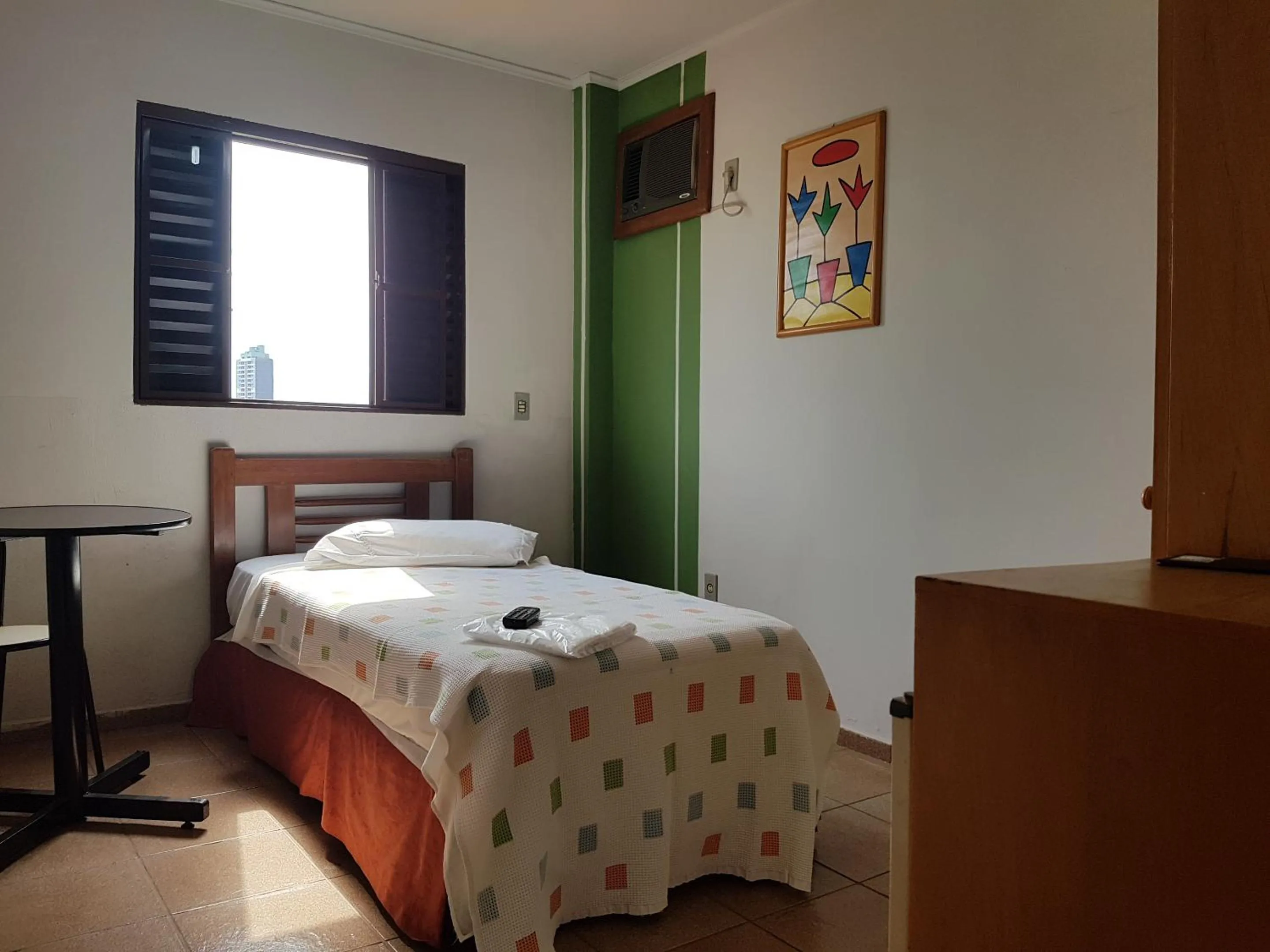 Bed in Colorado Plaza Hotel