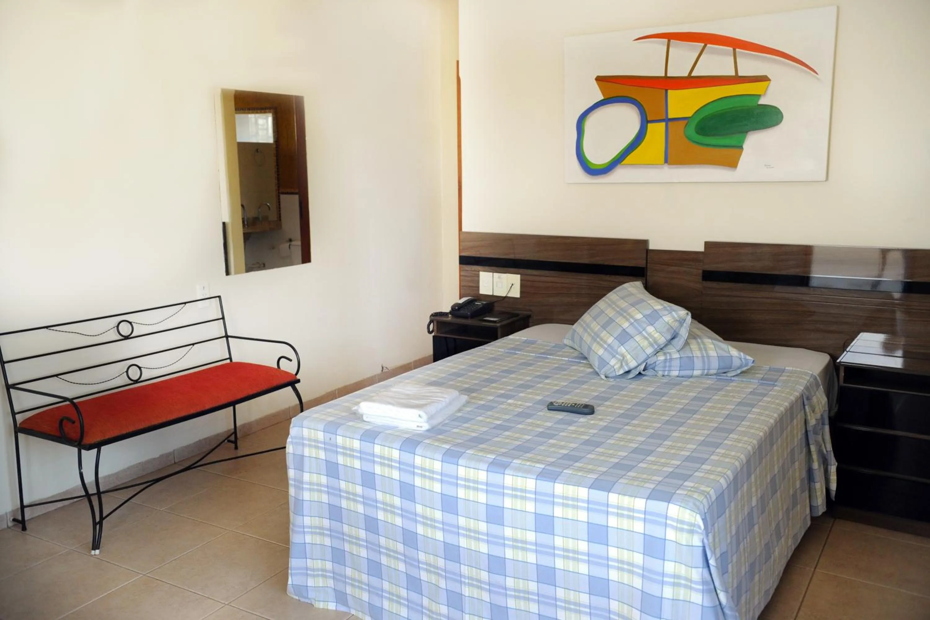 Bed in Colorado Plaza Hotel