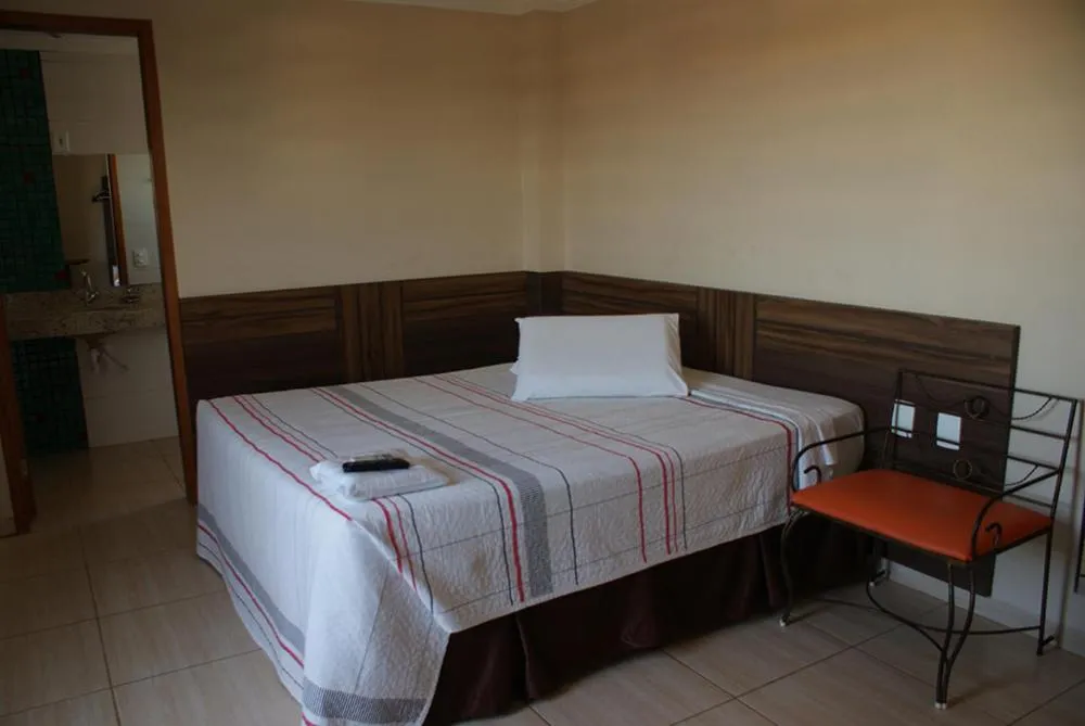 Bed in Colorado Plaza Hotel