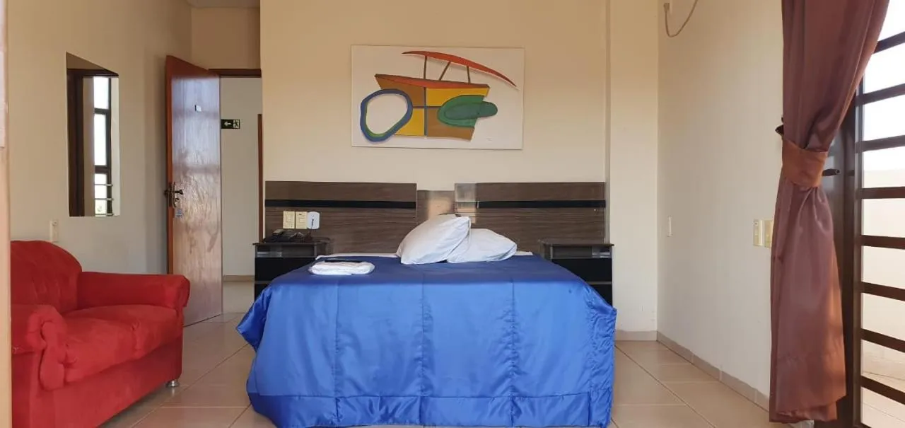 Bed in Colorado Plaza Hotel