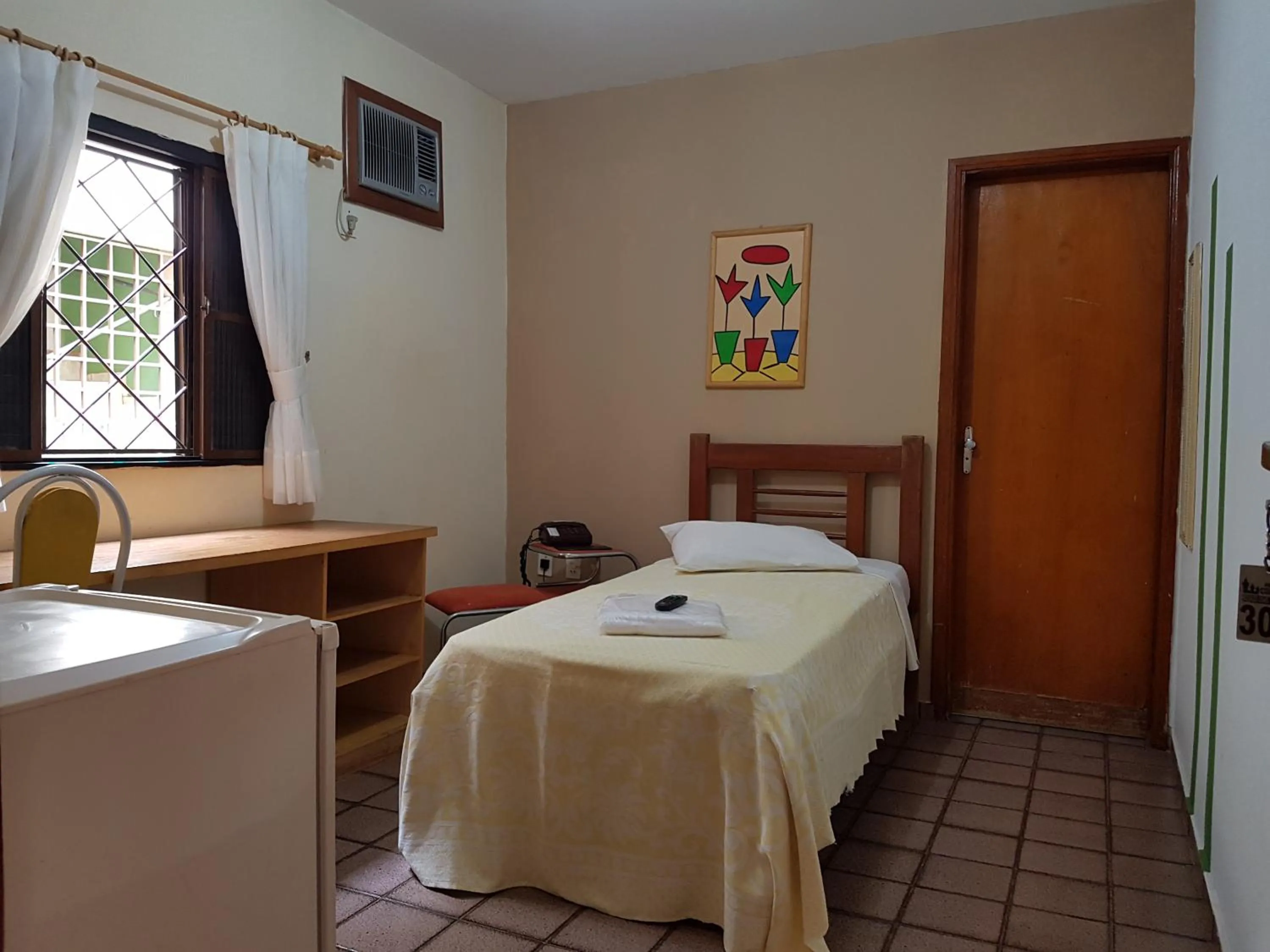 Bed in Colorado Plaza Hotel