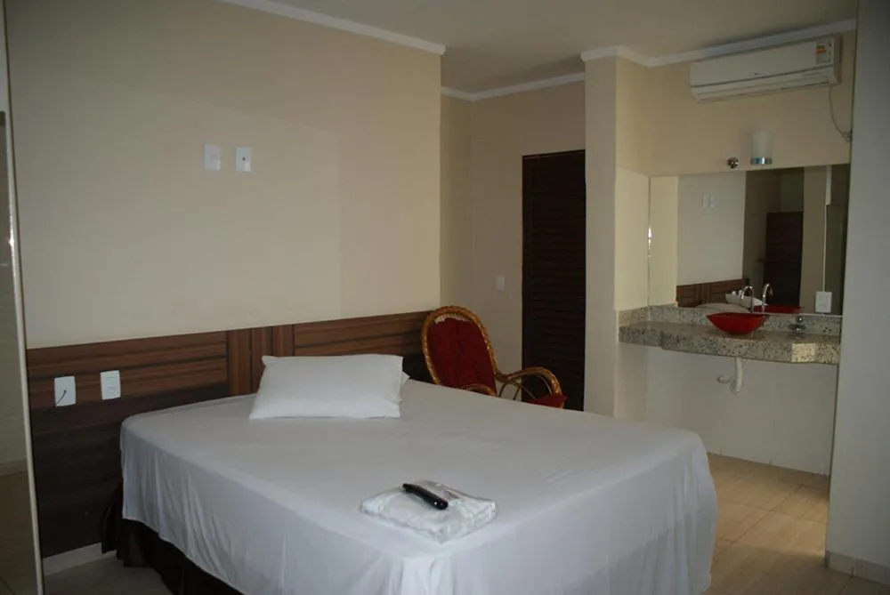 Bed in Colorado Plaza Hotel