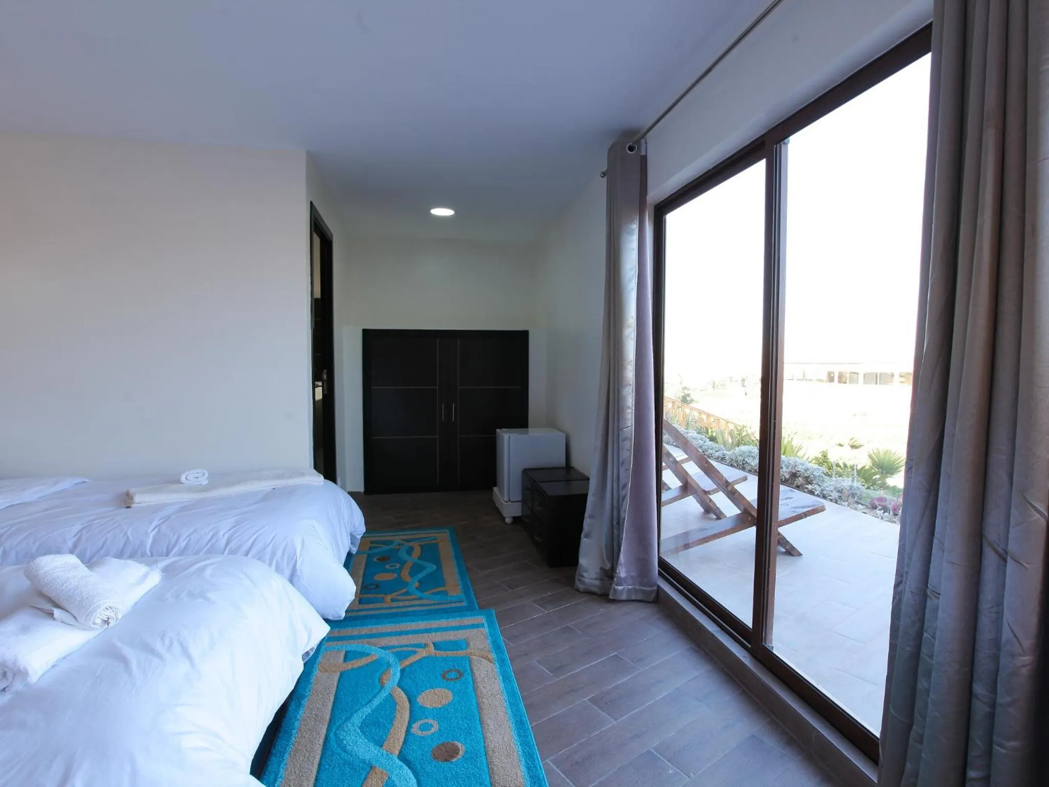 Photo of the whole room, Bed in Dakhla Kitesurf World