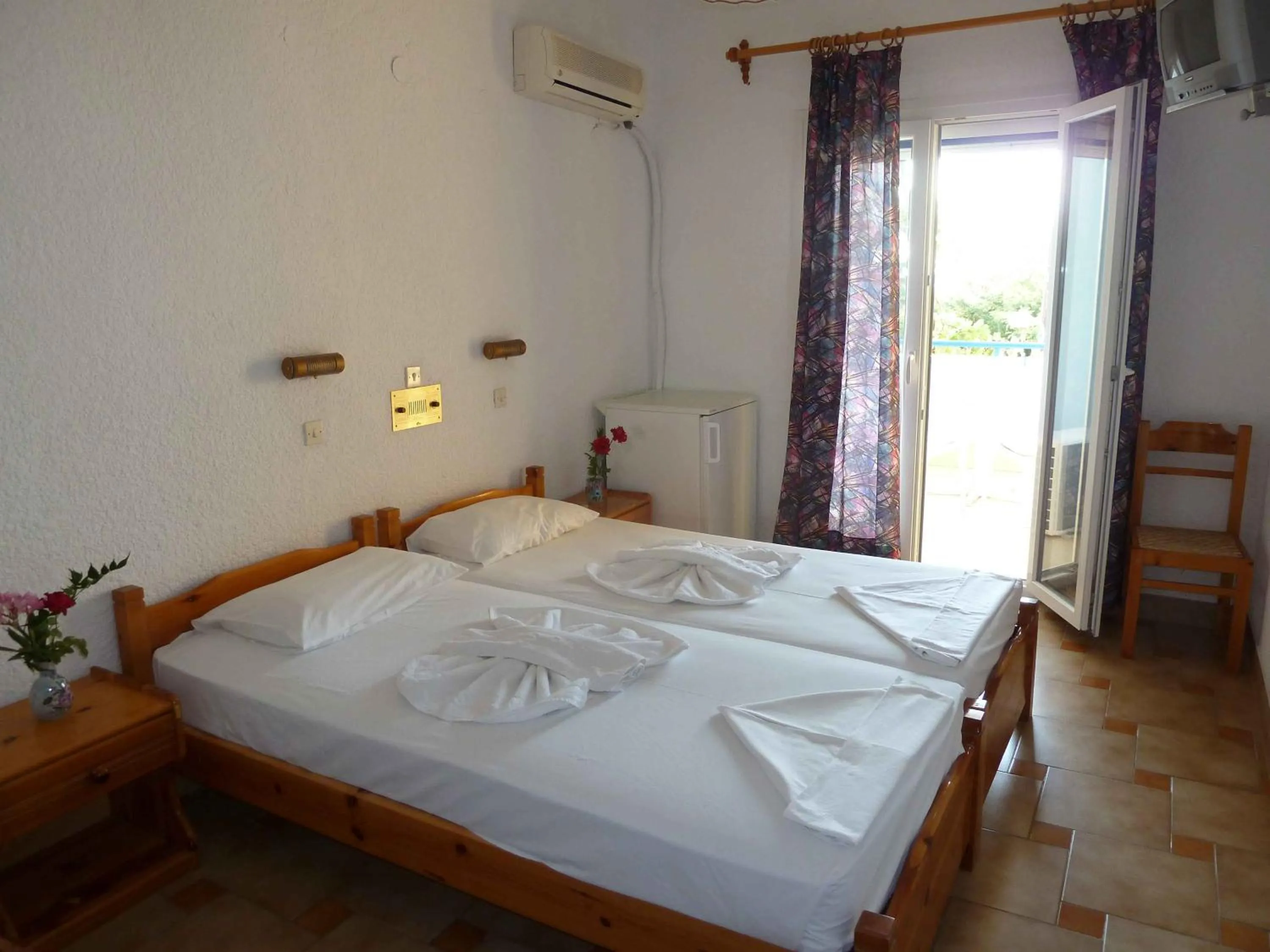 Bed in Paris Beach Hotel