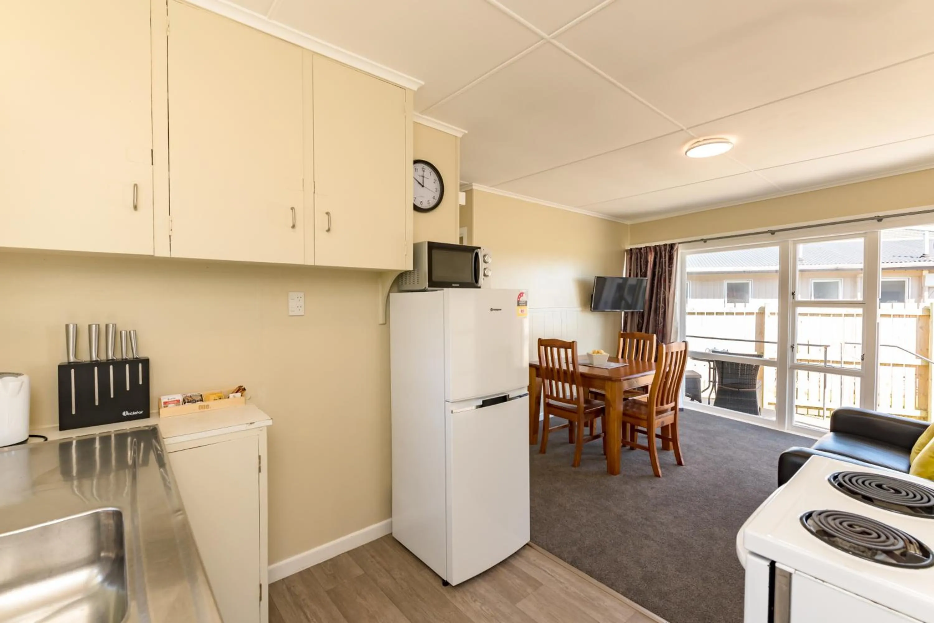 Kitchen or kitchenette in Waitangi Beach Bach 30B