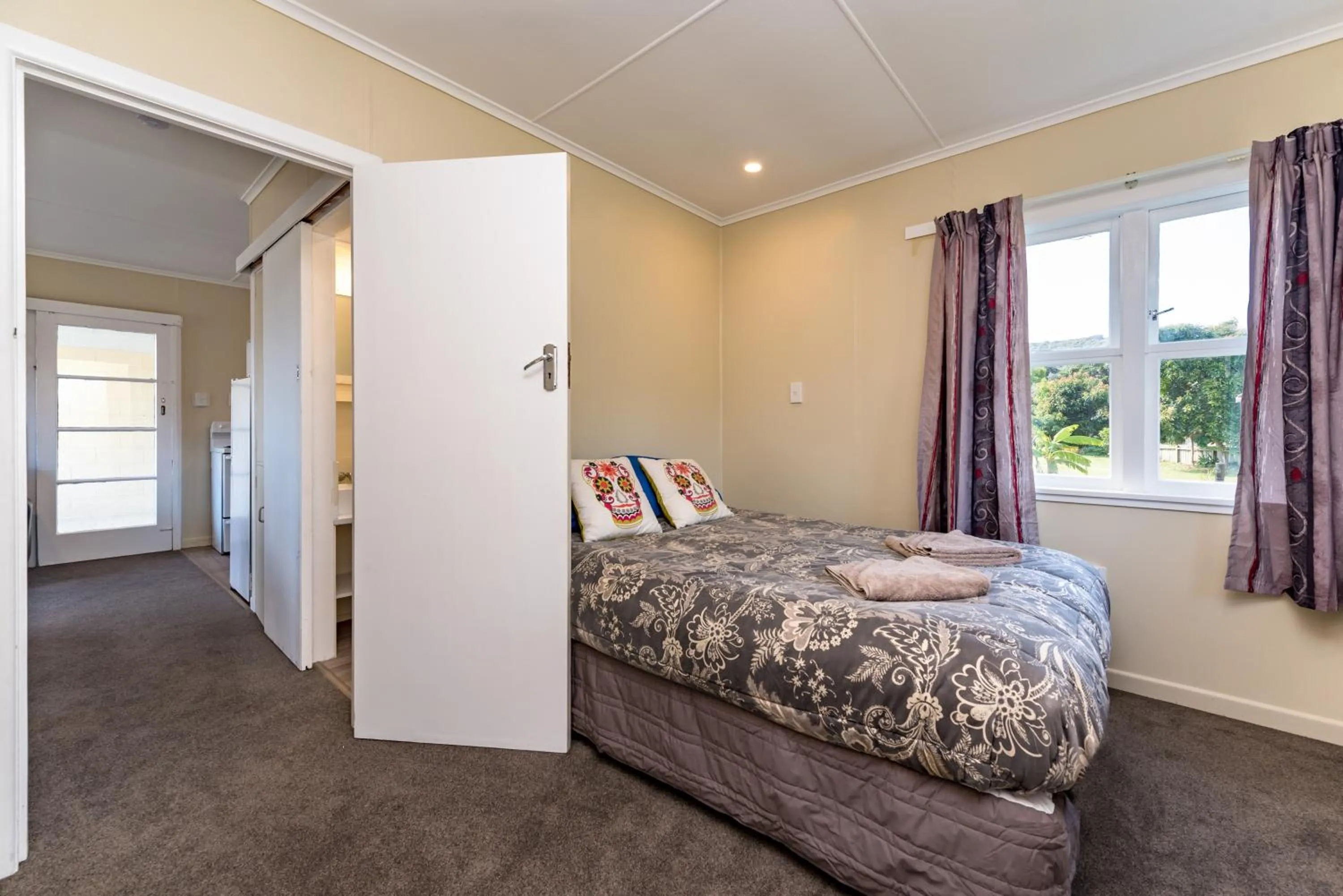 Bedroom in Waitangi Beach Bach 30B