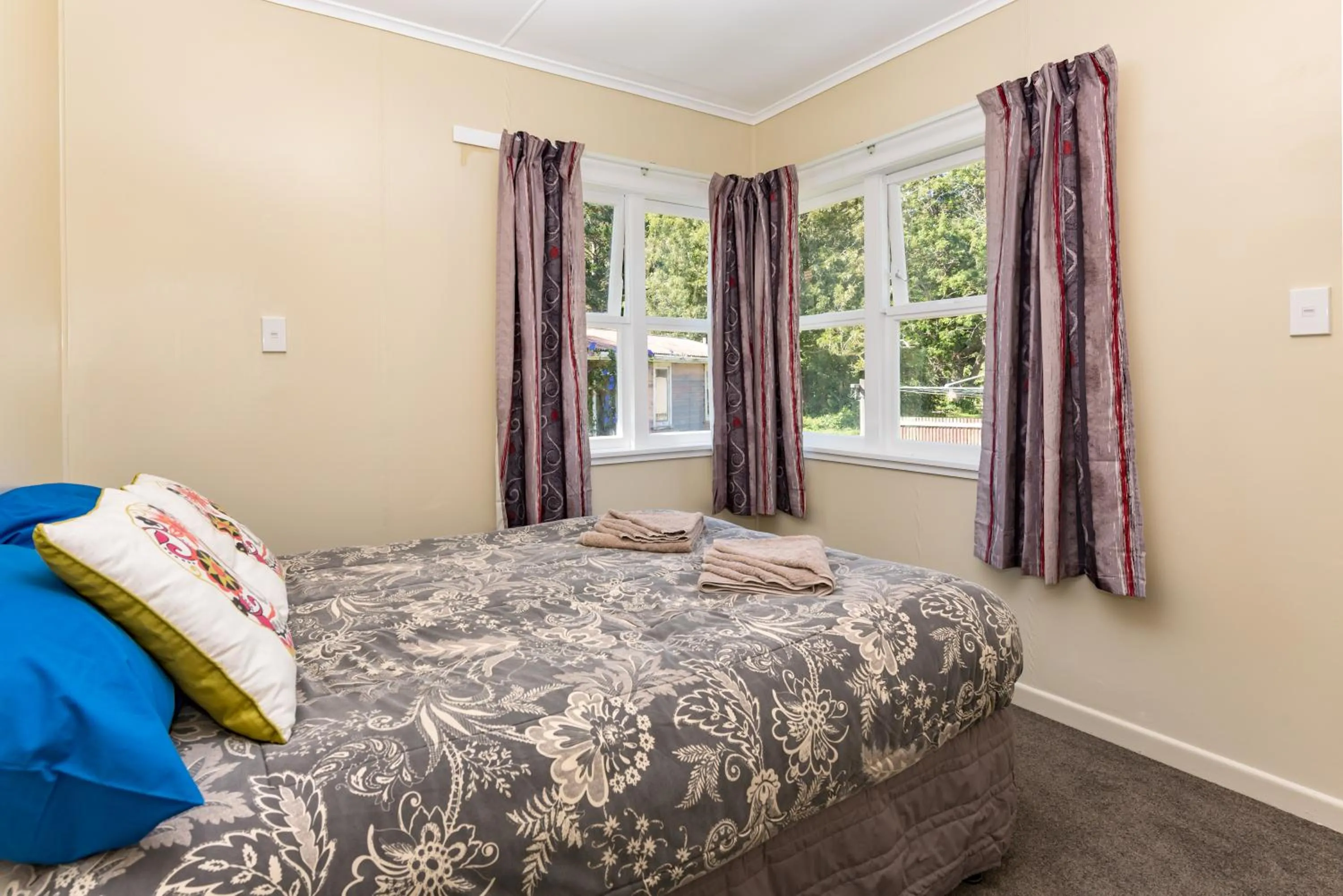 Bedroom in Waitangi Beach Bach 30B