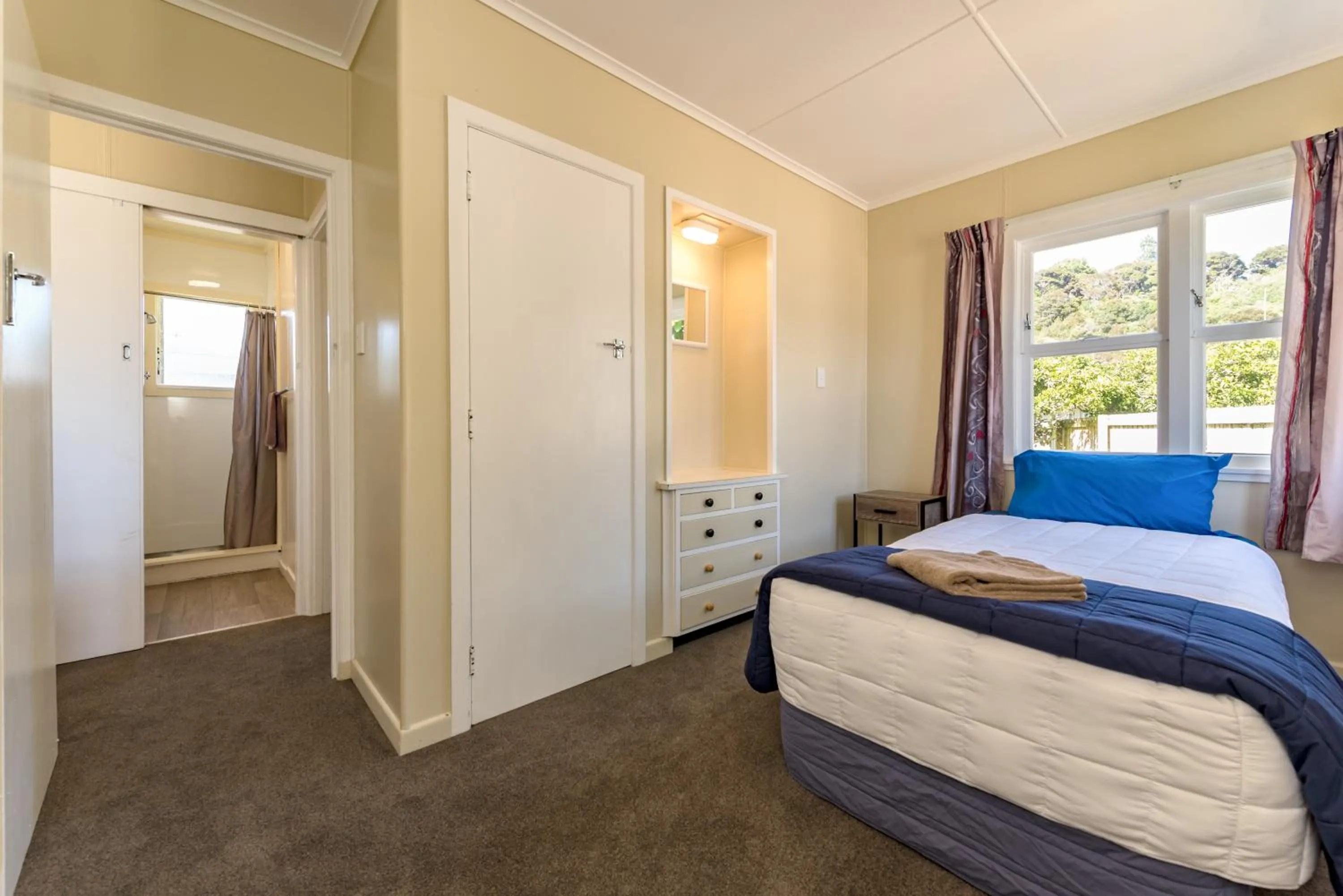 Bedroom in Waitangi Beach Bach 30B
