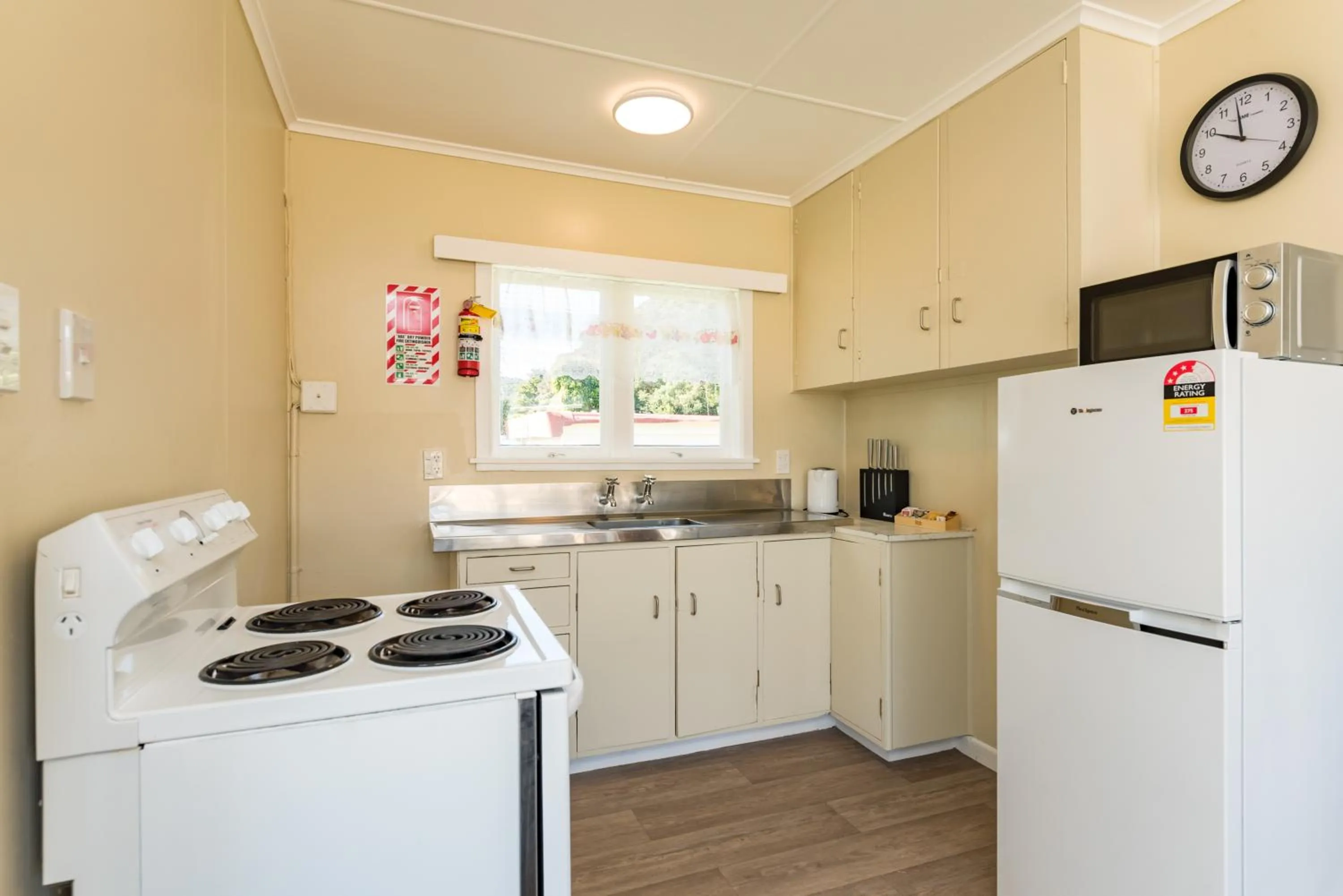 Kitchen or kitchenette in Waitangi Beach Bach 30B
