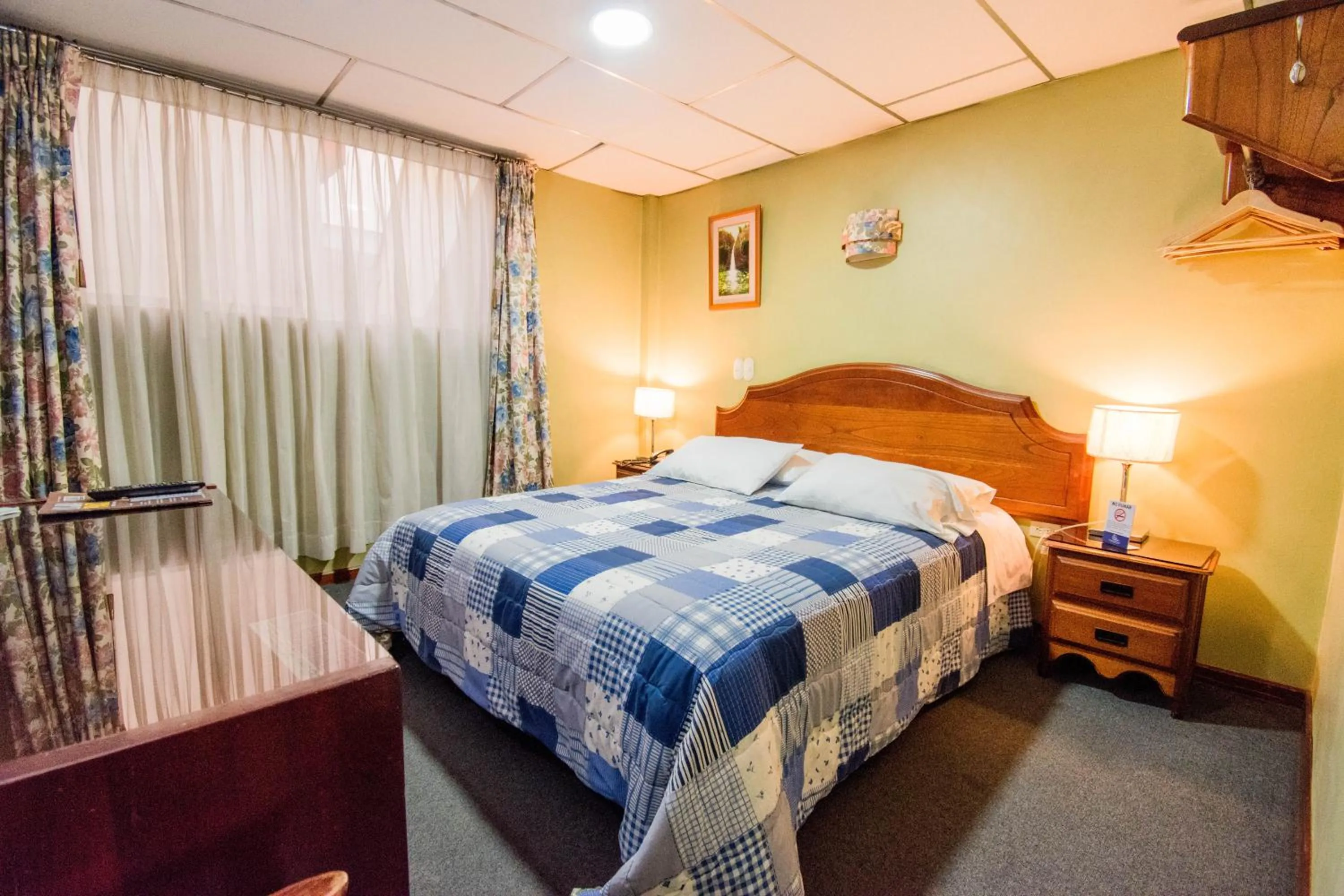 Bedroom in Grand Hotel Loja
