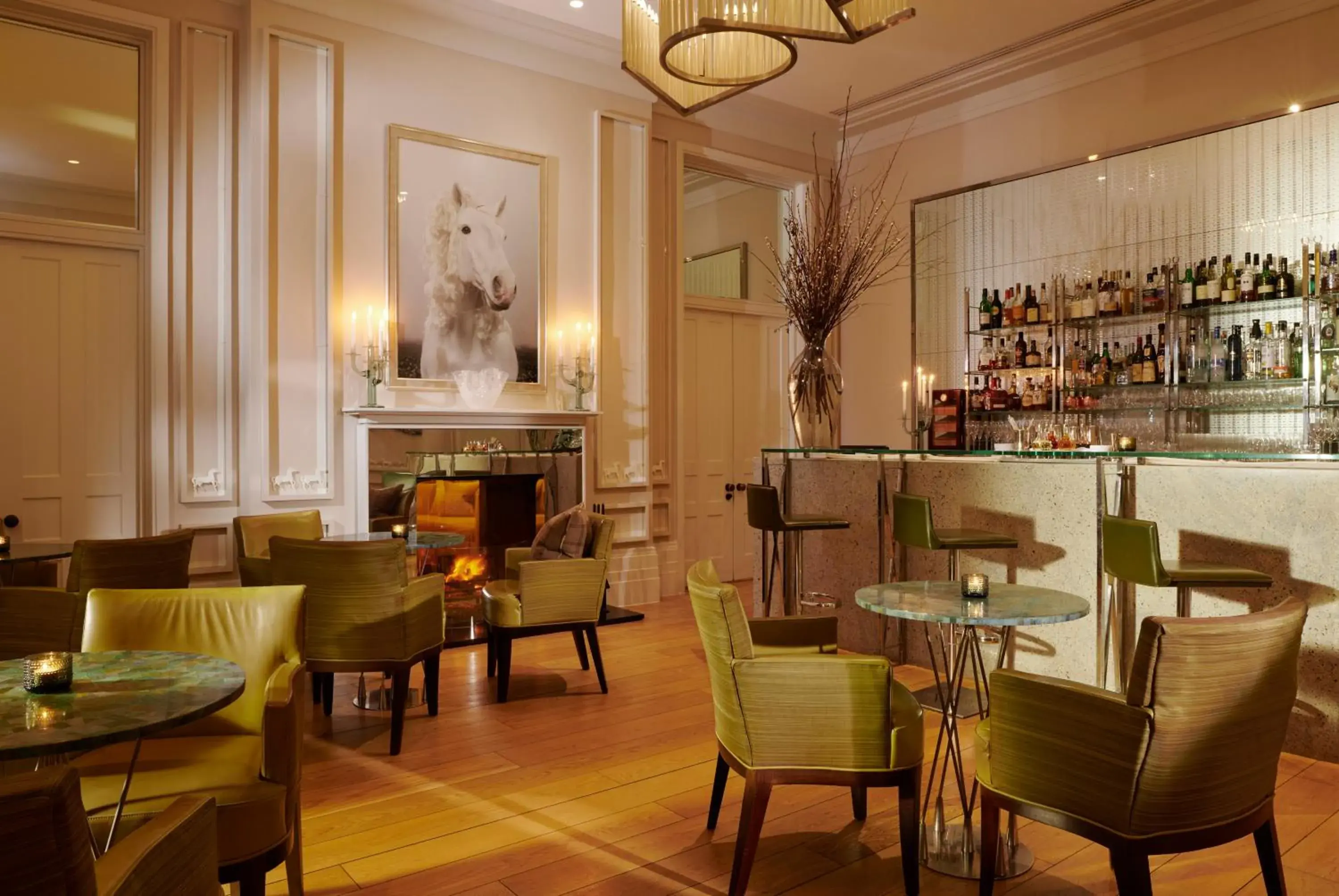 Lounge or bar in Coworth Park - Dorchester Collection Lounge or bar in Coworth Park - Dorchester Collection