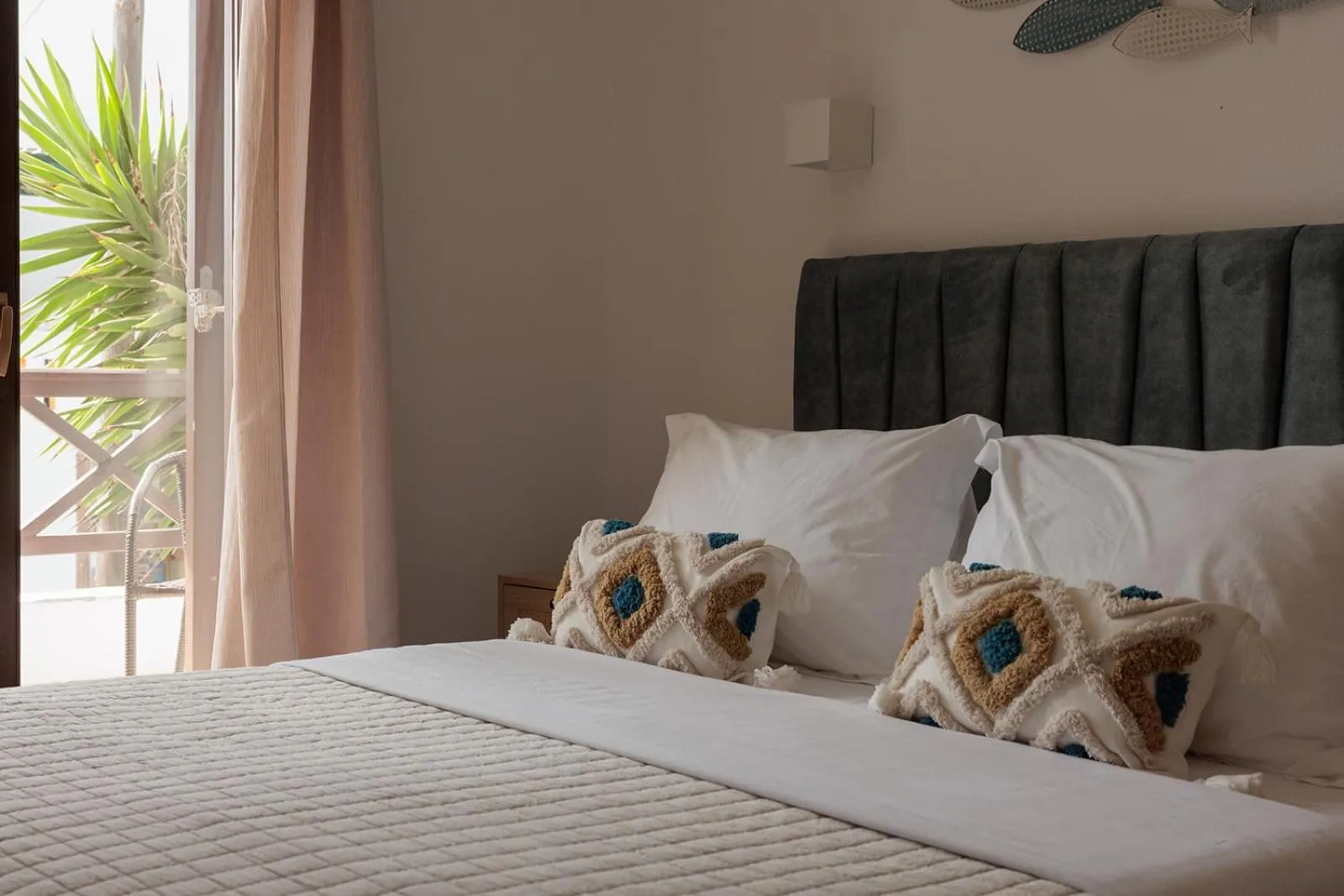 Bed in Anemomilos Beach hotel