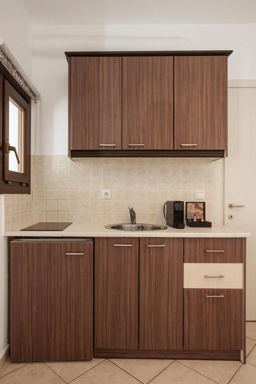 Kitchen or kitchenette in Anemomilos Beach hotel