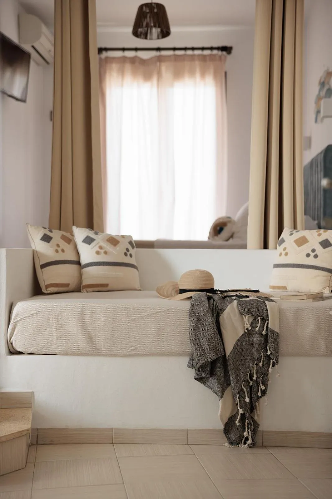 Seating area, Bed in Anemomilos Beach hotel