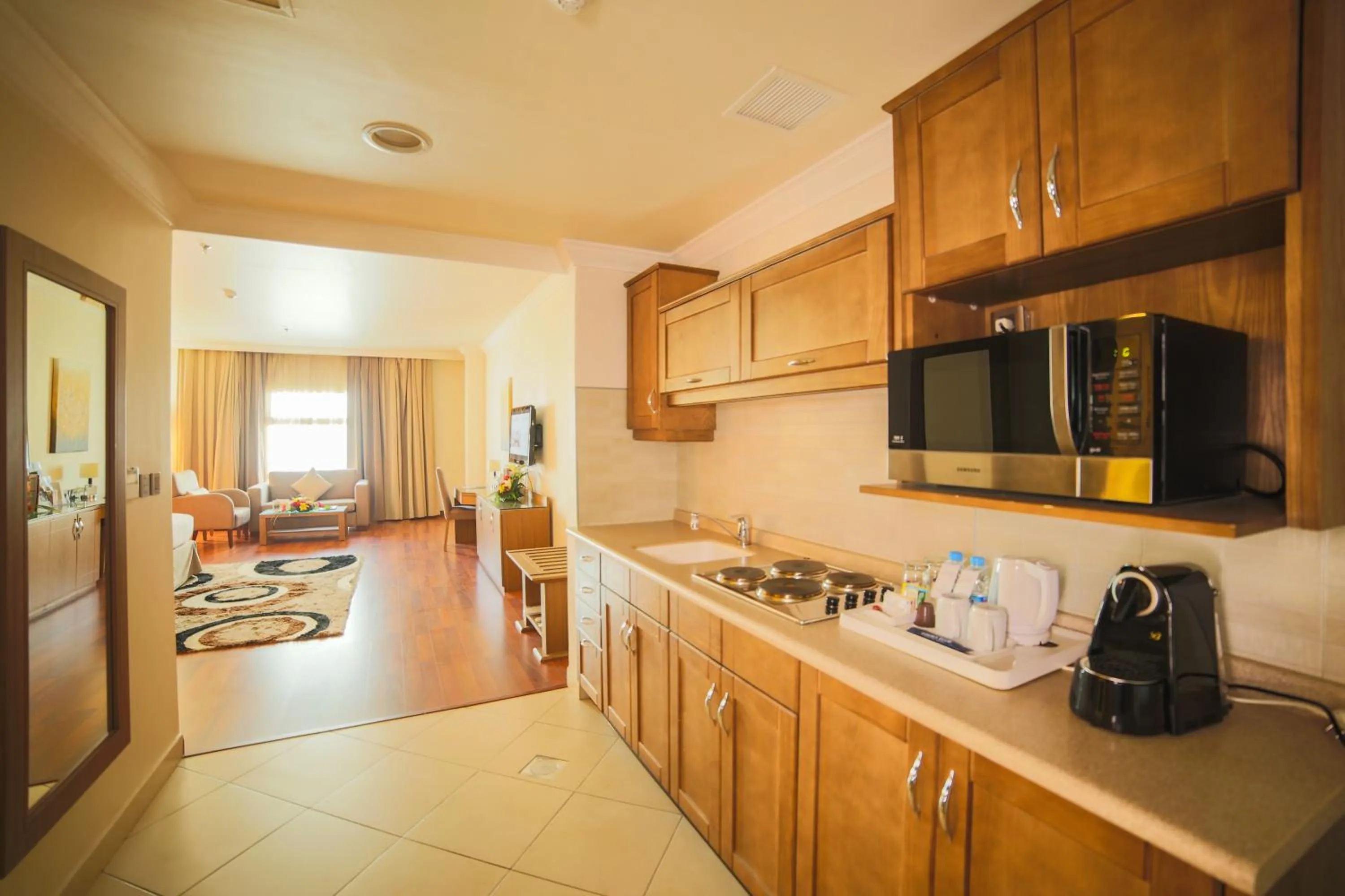 Kitchen or kitchenette in Golden Tulip Hotel Buraidah Al Qassim