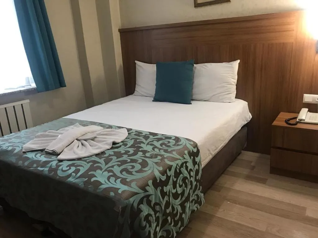 Bed in Grand Dilara Hotel