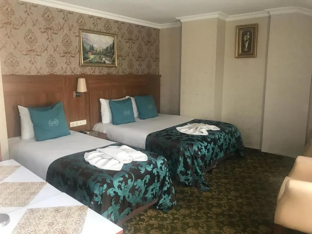 Quiet street view, Bed in Grand Dilara Hotel