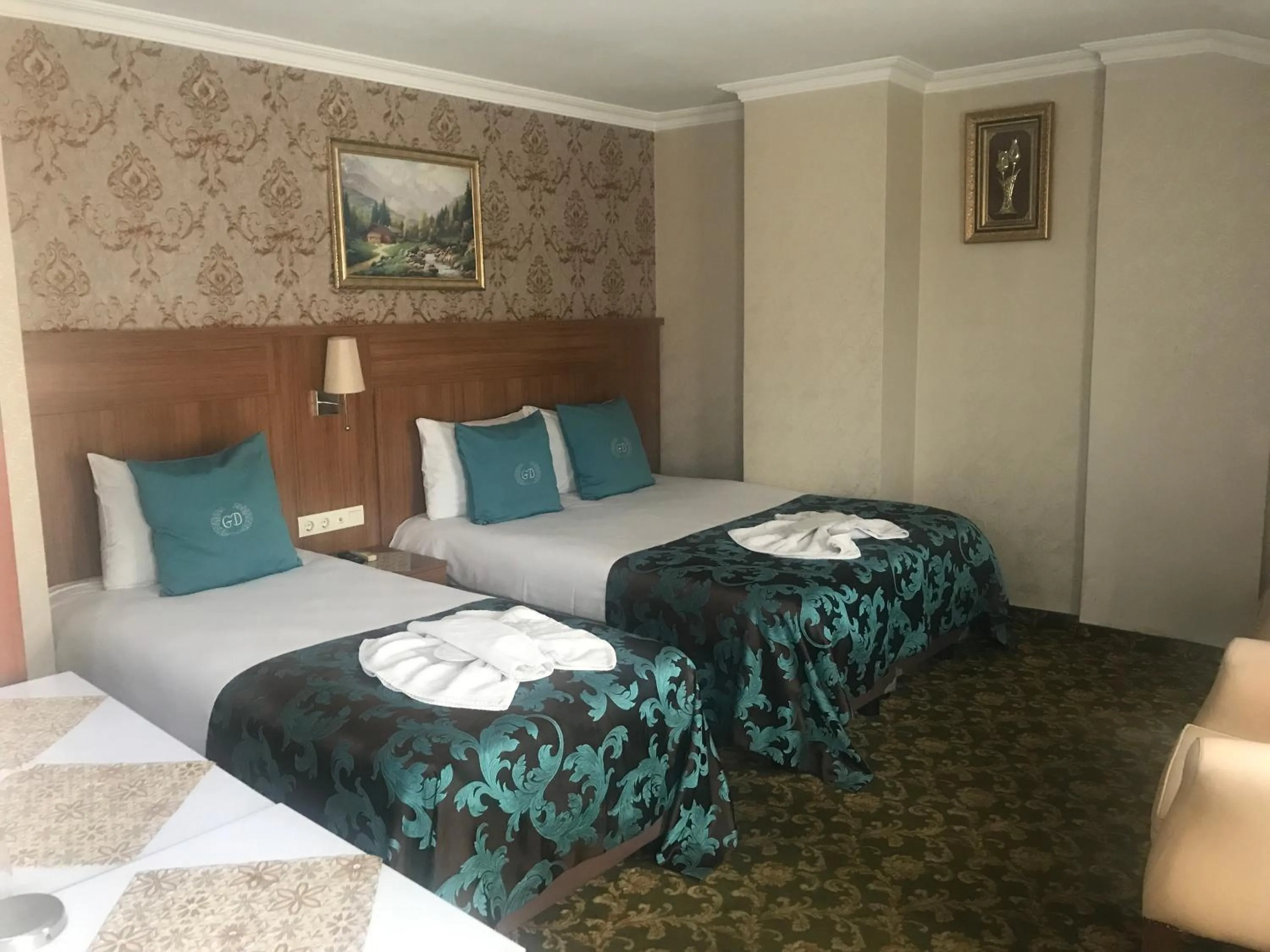 Bed in Grand Dilara Hotel