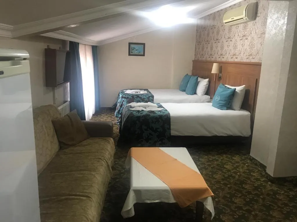 Bed in Grand Dilara Hotel