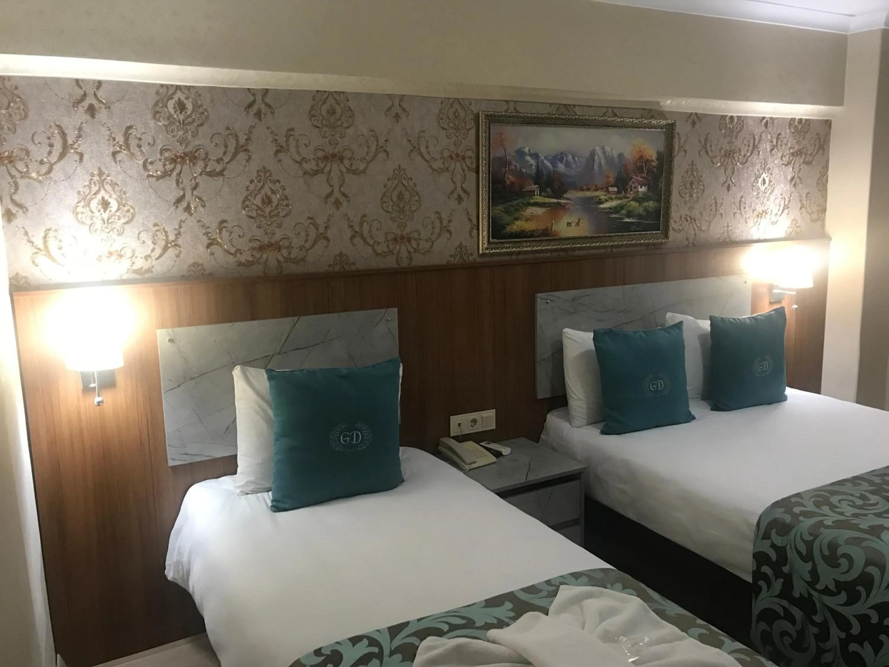 Bed in Grand Dilara Hotel