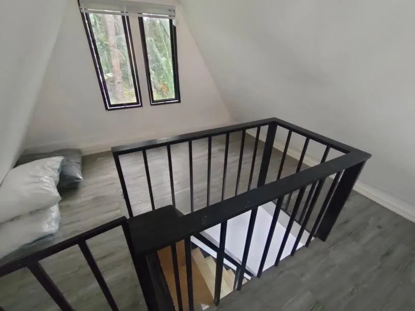 Bedroom, Bed in Seaside traveler's Inn by Camiguin Island Home