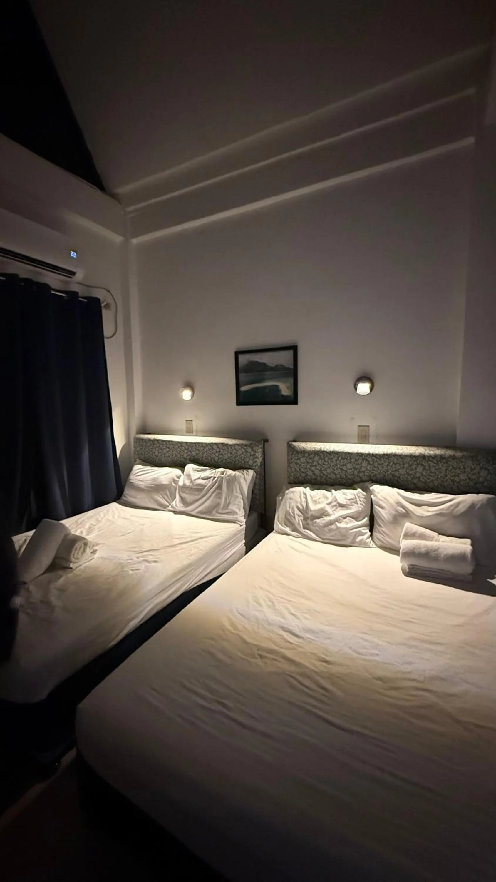 Bed in Seaside traveler's Inn by Camiguin Island Home