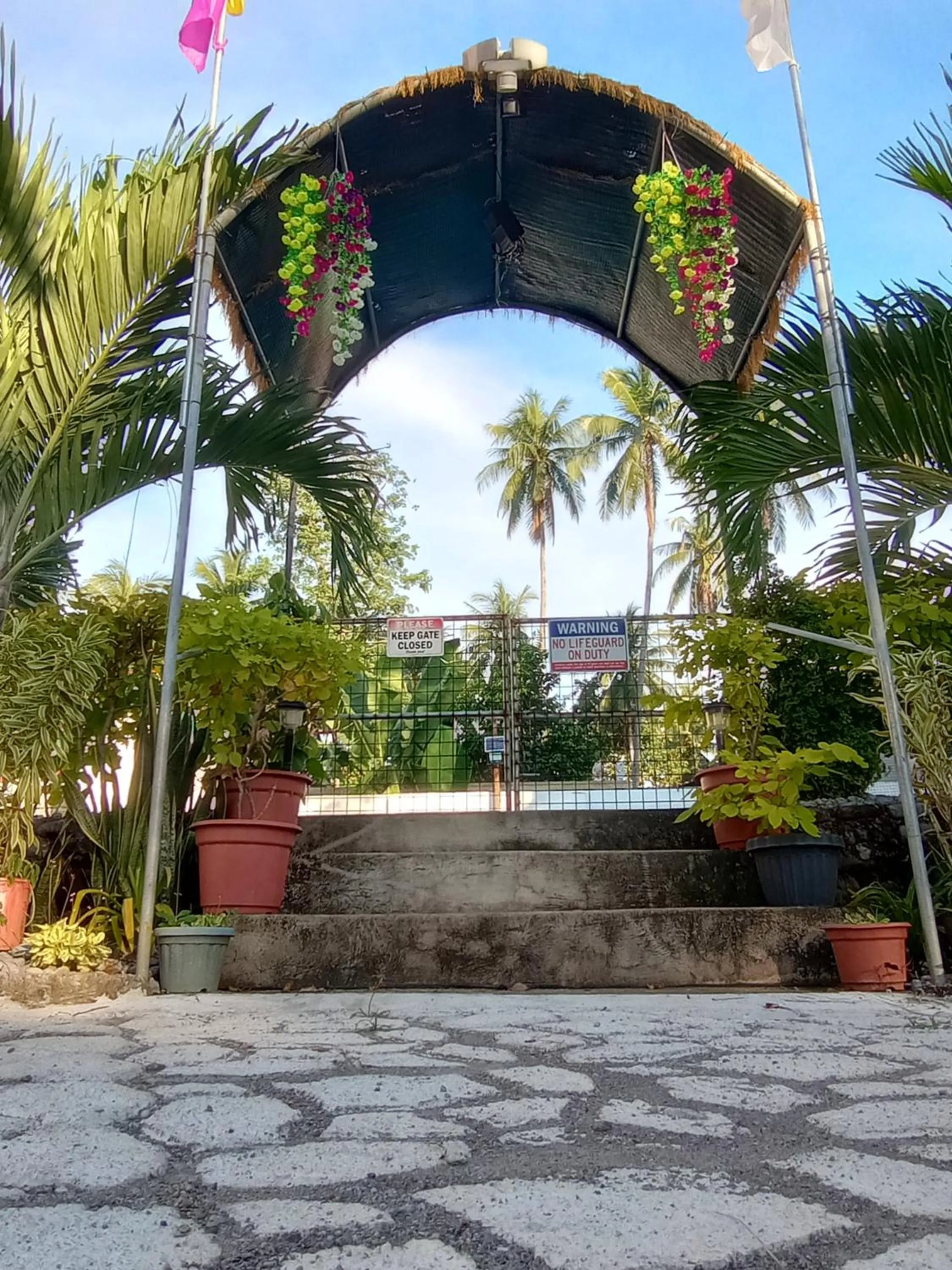 Swimming pool in Seaside traveler's Inn by Camiguin Island Home