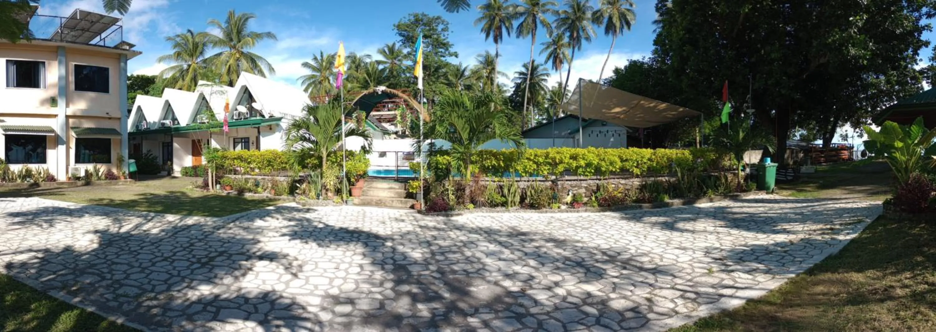 Swimming pool in Seaside traveler's Inn by Camiguin Island Home
