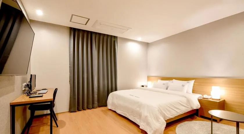 Bed in Blanc Business Hotel