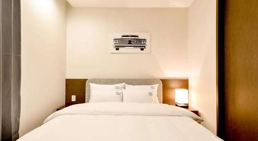 Bed in Blanc Business Hotel