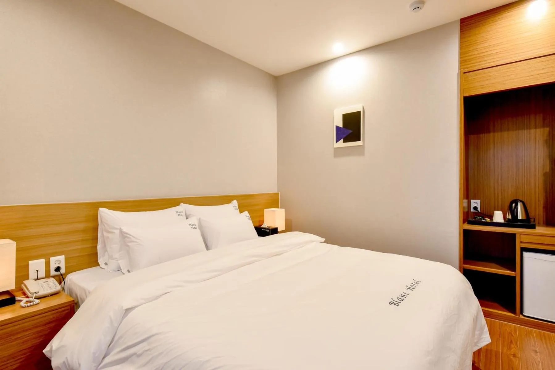 Bed in Blanc Business Hotel