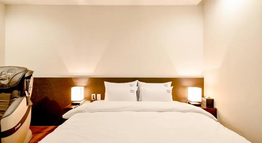 Bed in Blanc Business Hotel