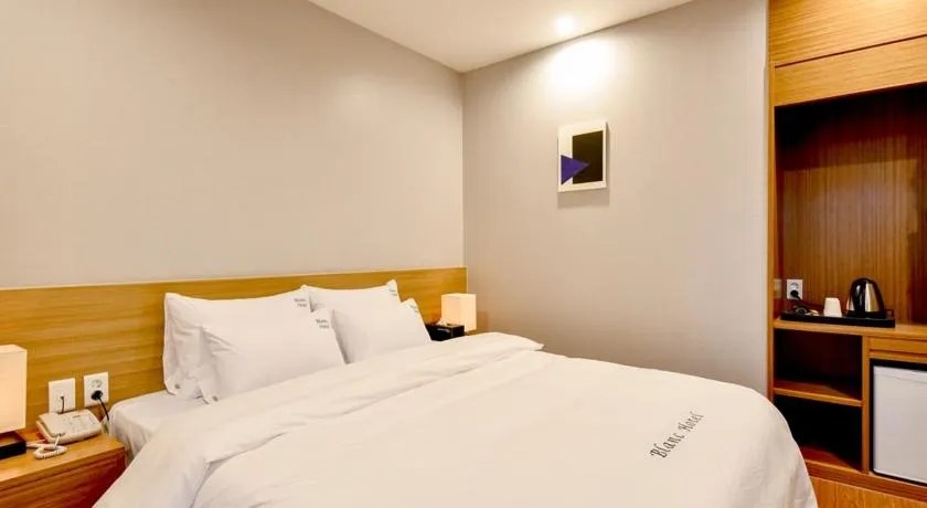 Bed in Blanc Business Hotel