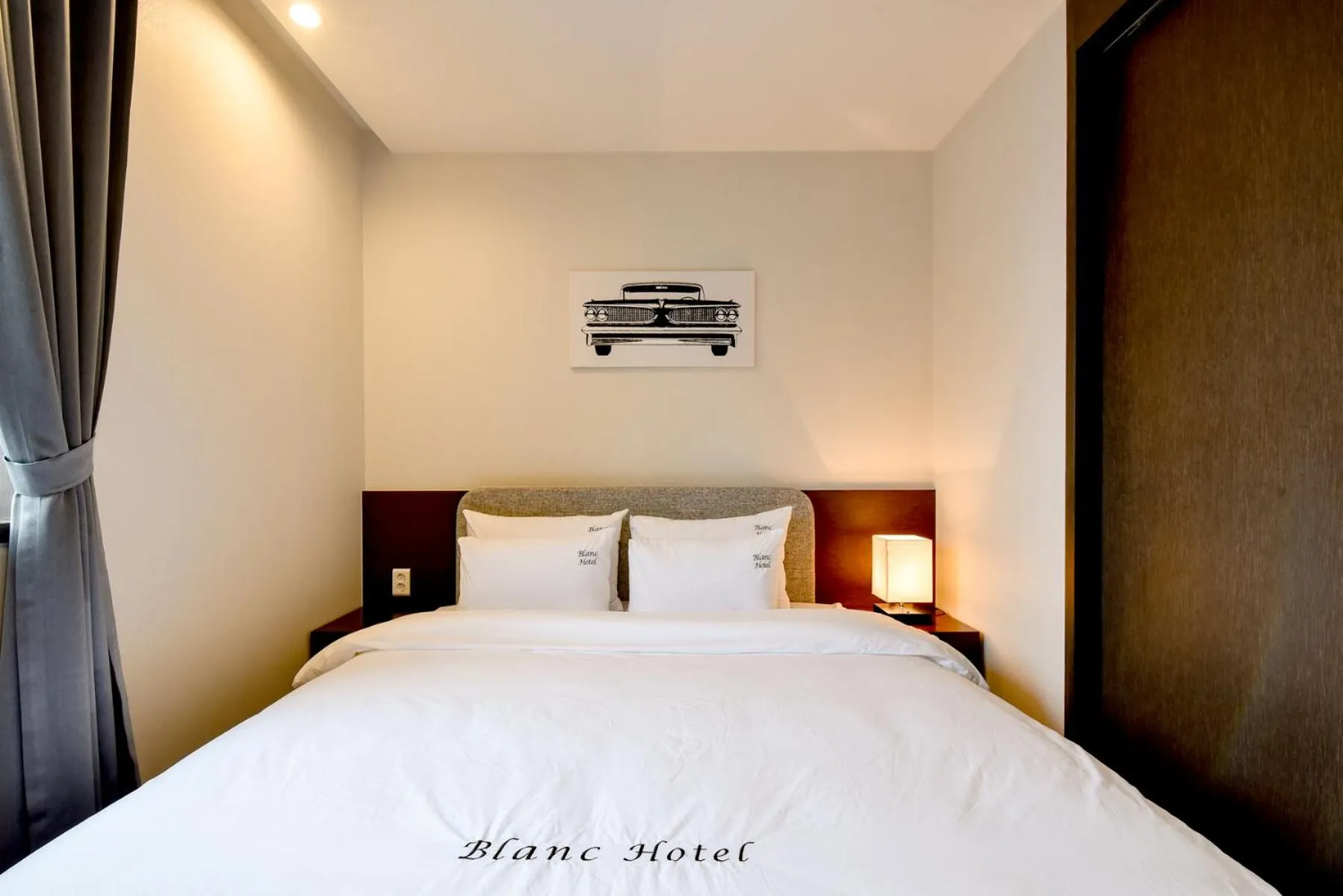 Bed in Blanc Business Hotel