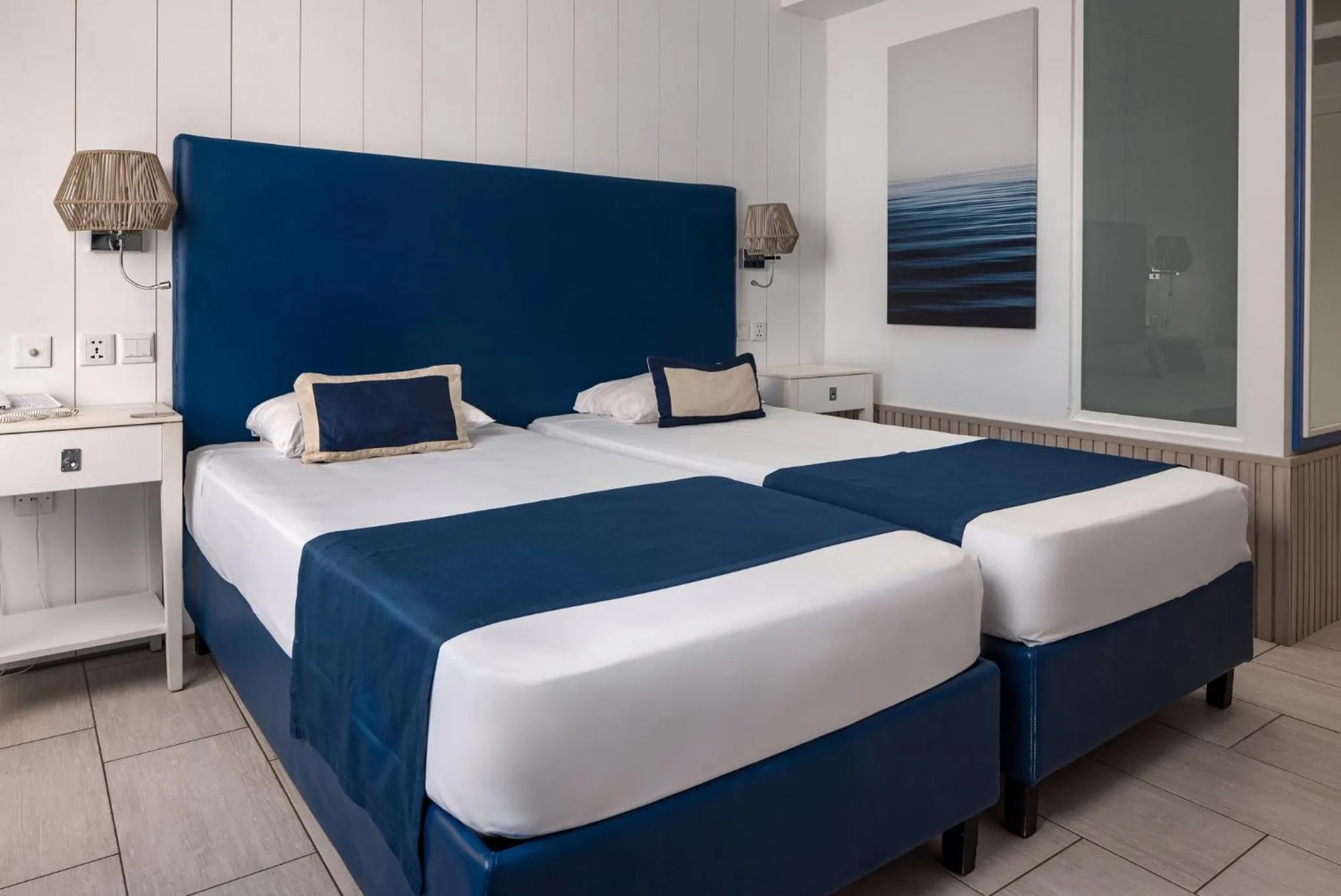 Bed in db Seabank Resort + Spa All Inclusive
