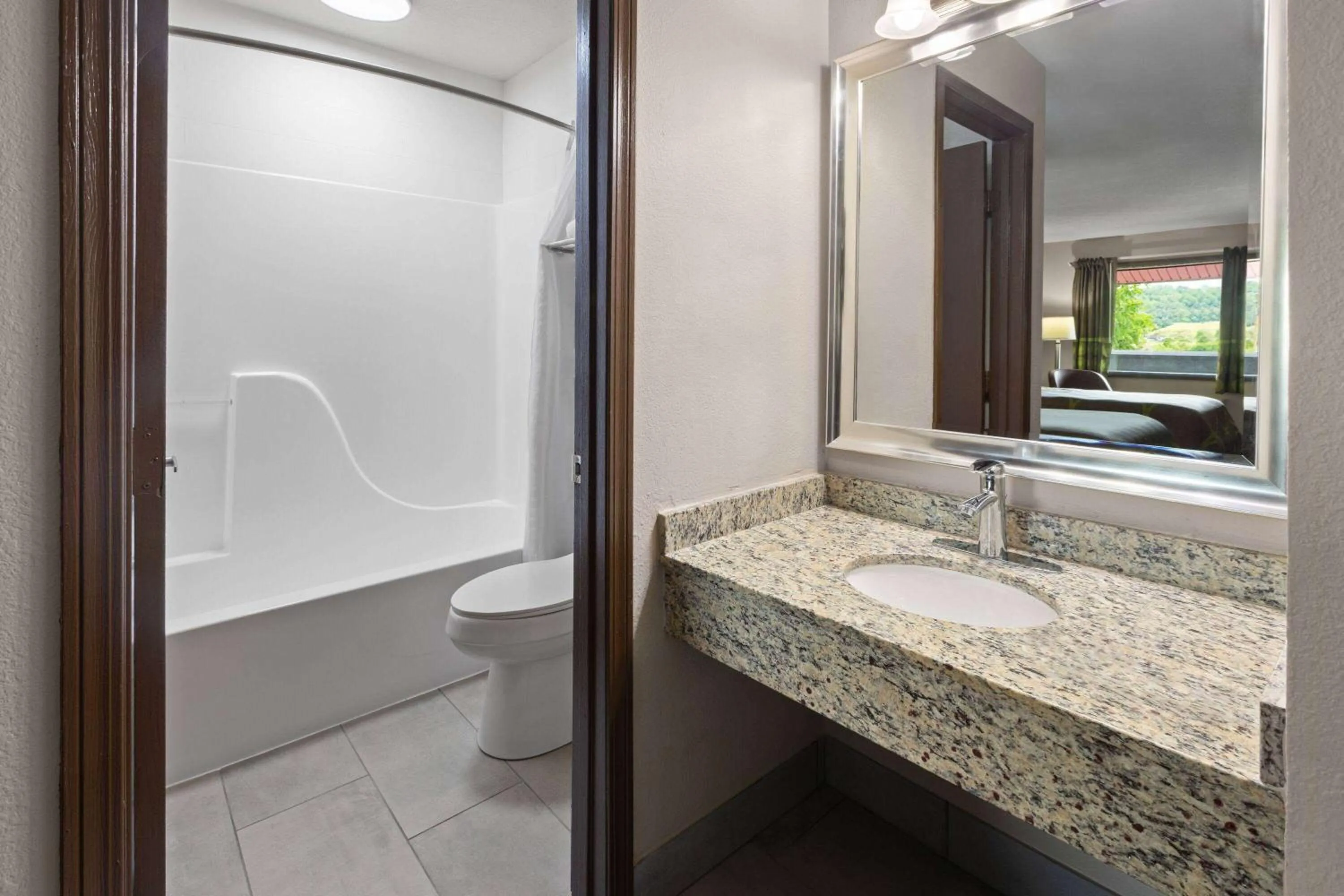 Bathroom in Super 8 by Wyndham Bridgeport/Clarksburg Area