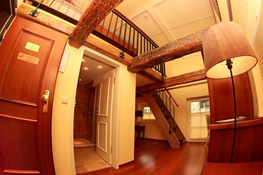 Photo of the whole room in Hotel Denkmal 13 Rostock - Kaufmannshaus Krahnstöver