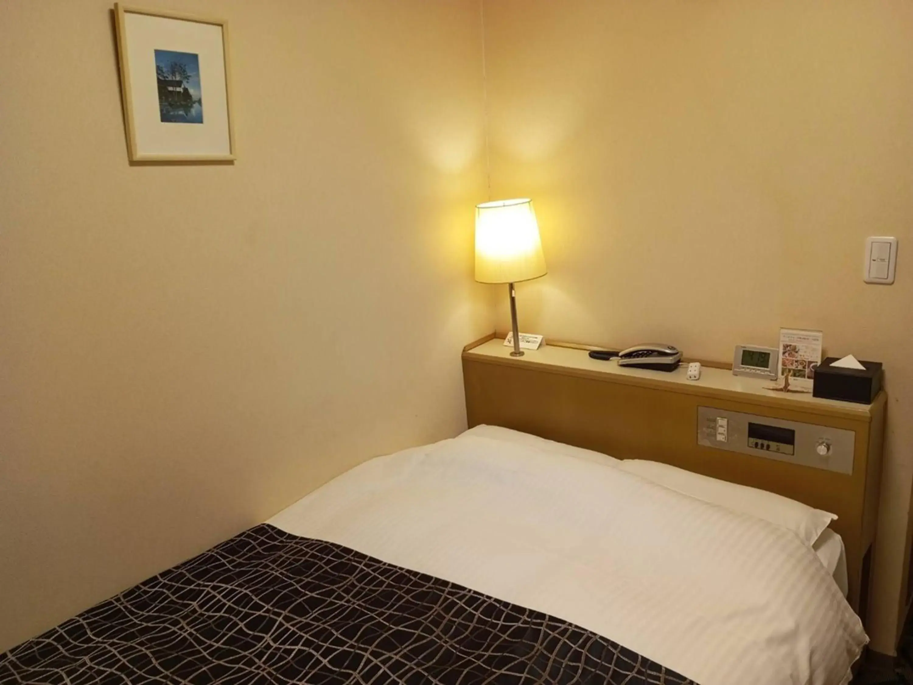 Bed in APA Hotel Isehara-Ekimae Bed in APA Hotel Isehara-Ekimae